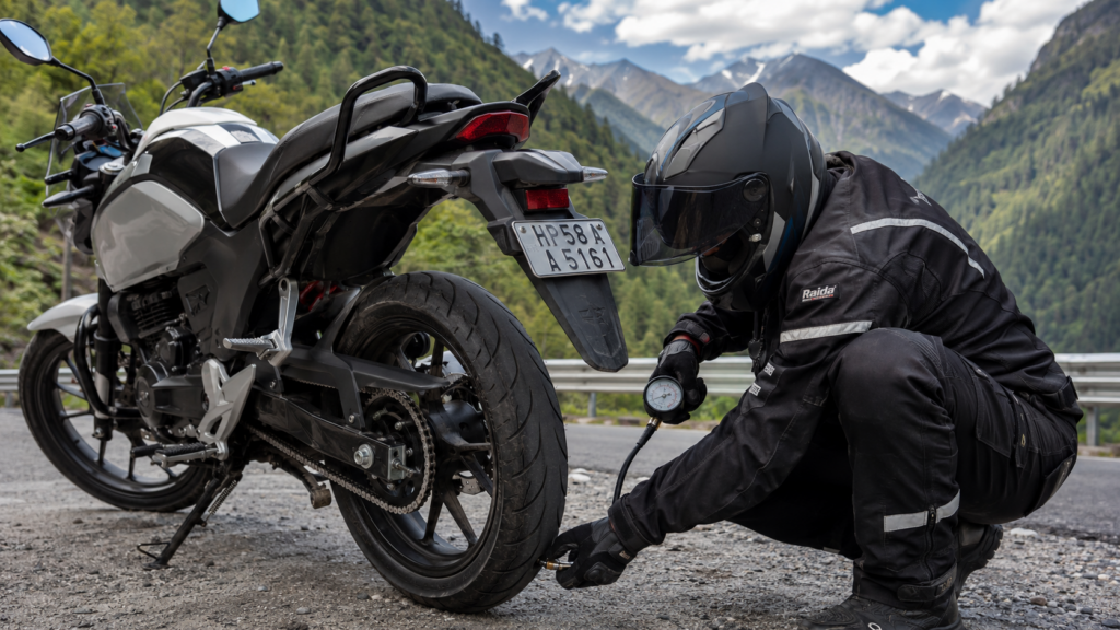 Motorcycle rider checking tire pressure and chain condition before an eco-friendly ride